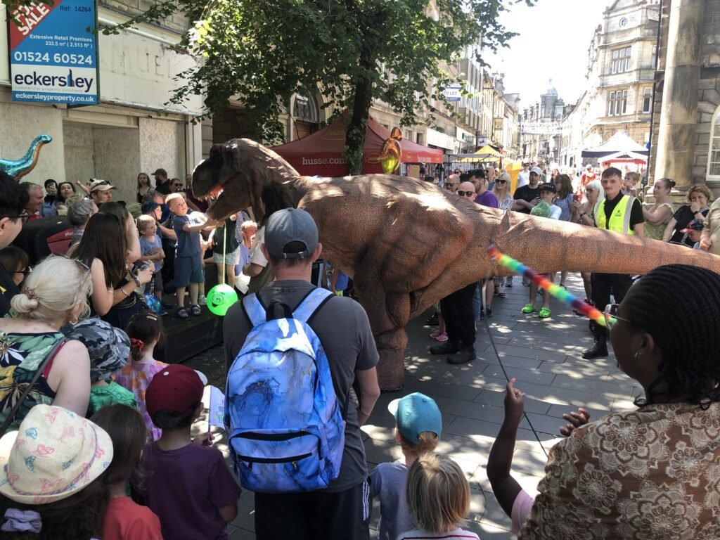 Crowds meeting T Rex at Dinofest Lancaster